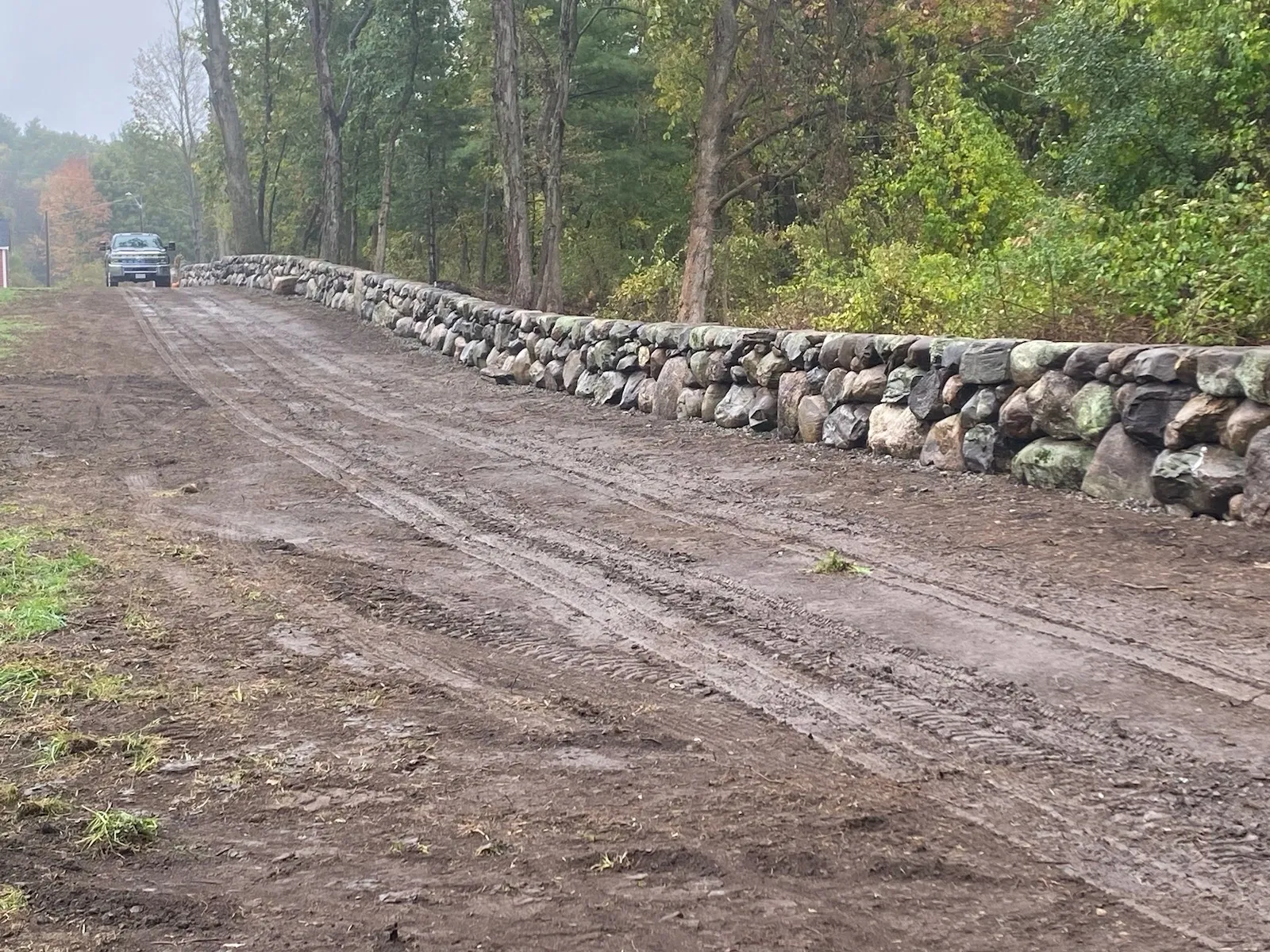 This stone wall was constructed by using the stones from the property of this gentleman's farm