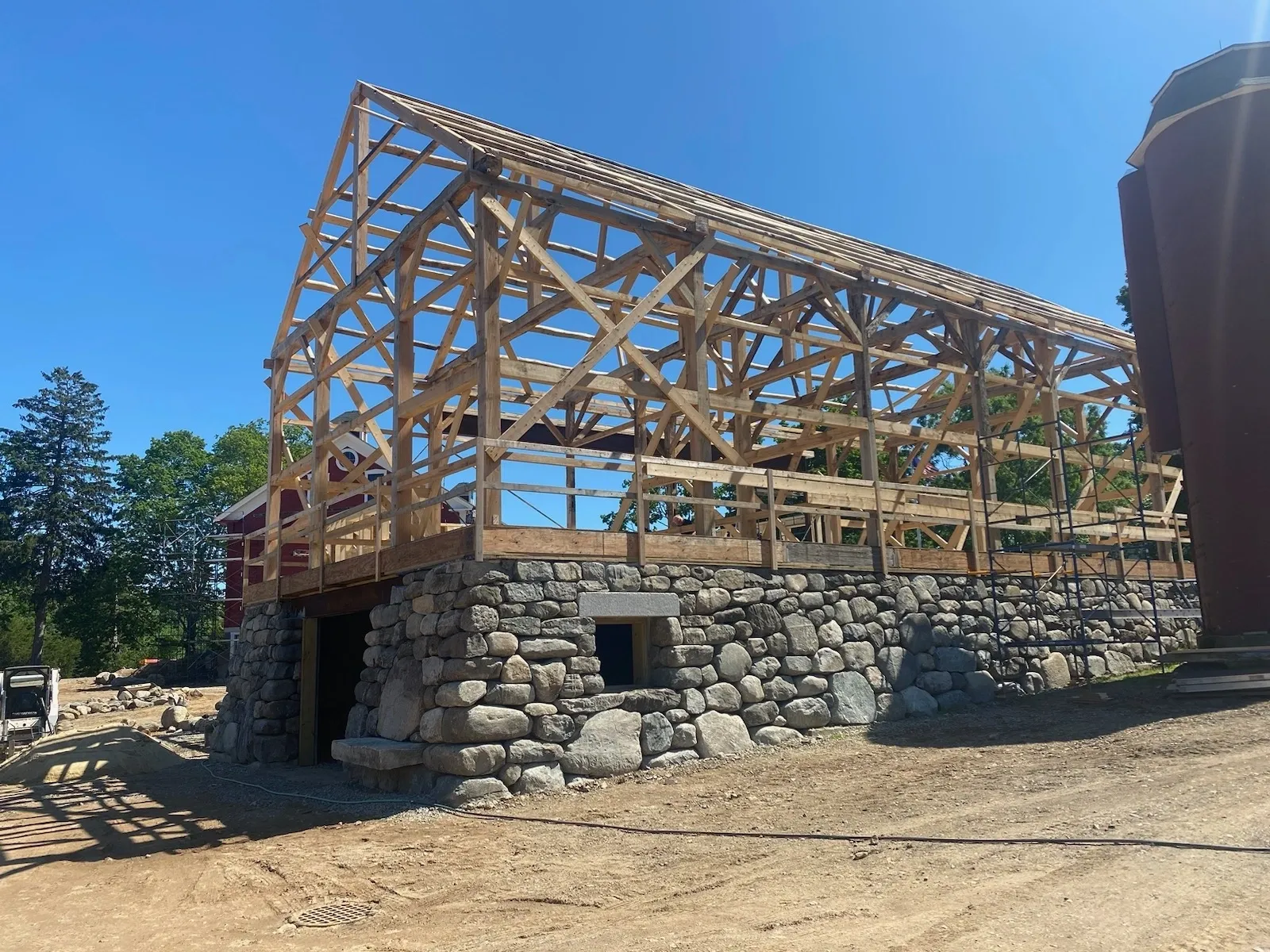 Stone foundation supports barn structure